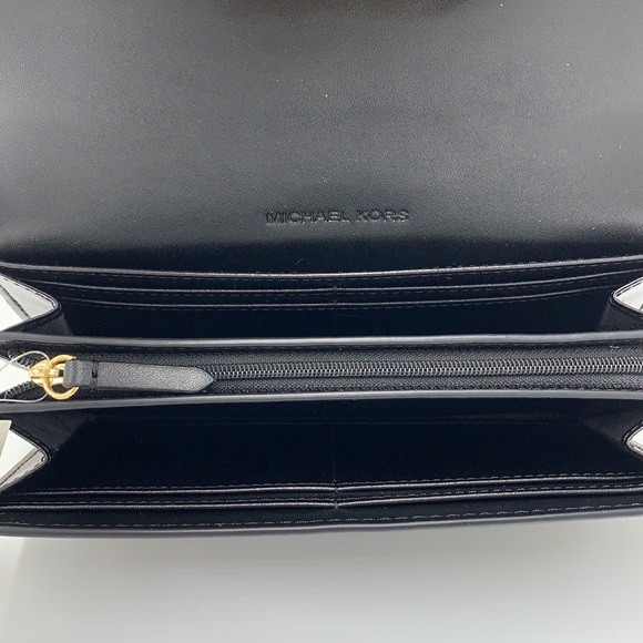 Brand New with Tag
Michael Kors Large Mimi Bifold Wallet
Color: Black - Picture 11 of 16